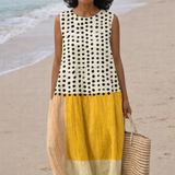 Lía | Vestido midi de bloques de color con lunares